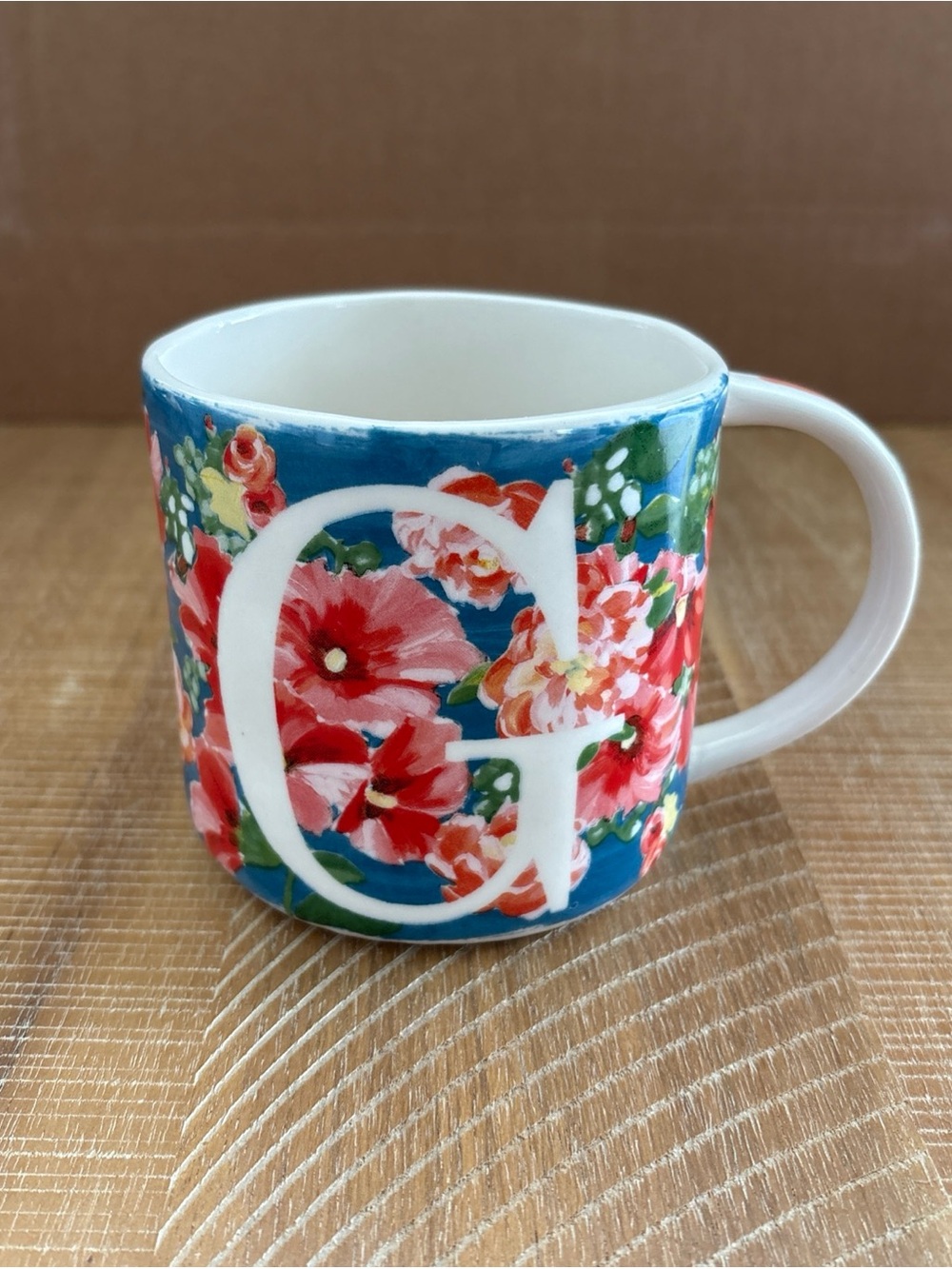 Anthropologie Floral Motif Letter “G Features A Blue and Pink Water Color Design